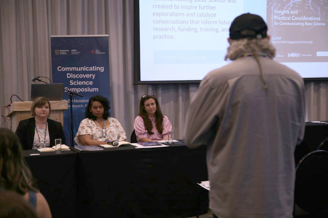 A question being addressed to the panel during the plenary session "SciPEP origins and findings.