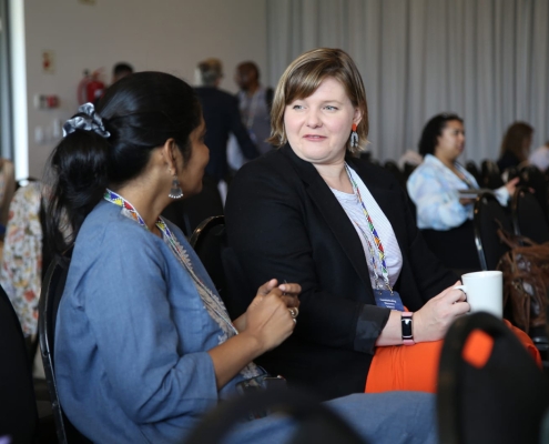 Delegates connecting during the morning session of the Communicating Discovery Science Symposium, Day 1.