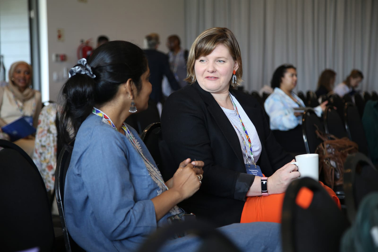 Delegates connecting during the morning session of the Communicating Discovery Science Symposium, Day 1.