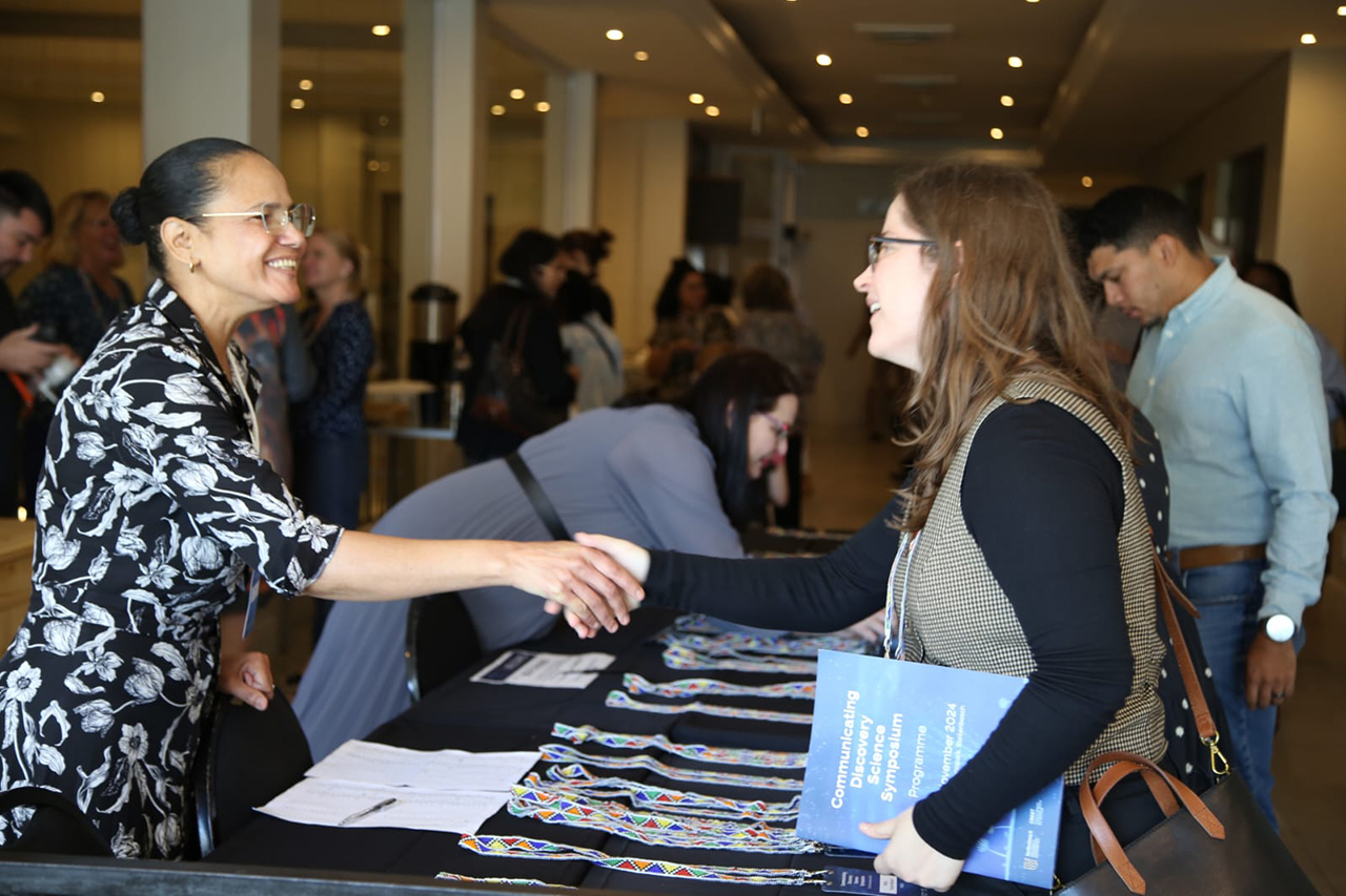 Excitement is in the air as delegates begin the registration process for the Communicating Discovery Science Symposium. The journey to insightful conversations and networking starts here.