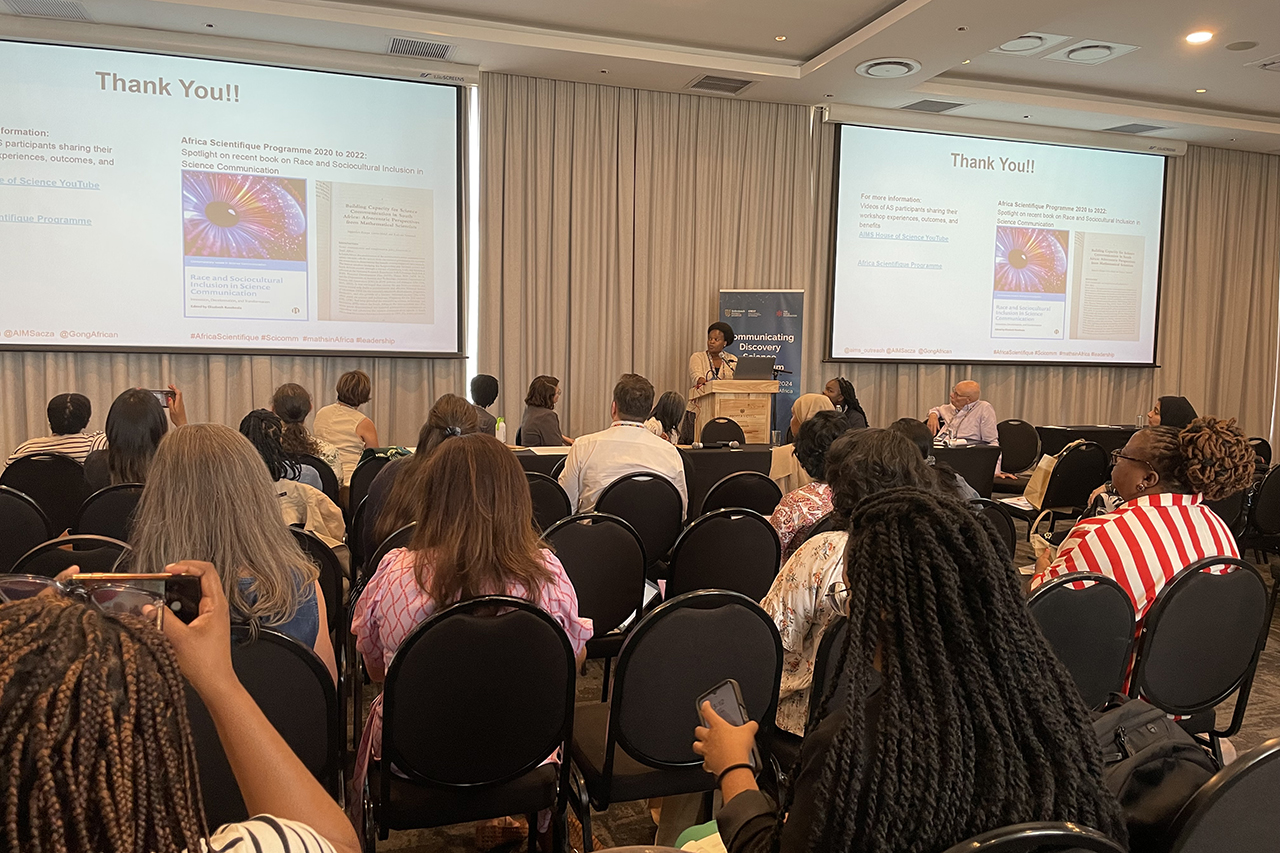 Rejoyce Gavhi-Molefe from the African Institute for Mathematical Sciences (South Africa) presents on advancing science communication in Africa, focusing on reframing Afrocentric perspectives.