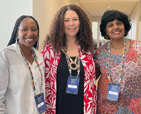 South African delegates Julia Ndlazi (Africa Health Research Institute), Janice Limson (Rhodes University), and Anusuya Chinsamy-Turan (University of Cape Town) connect during the event.