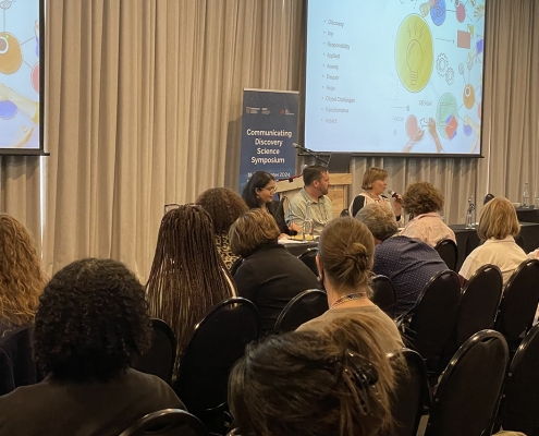 The panel at Plenary 7, "Integrating Policy as an Outcome of Discovery Science Communication," featured Kamini Govender, Michael Ellis, and Allison Eckhardt.