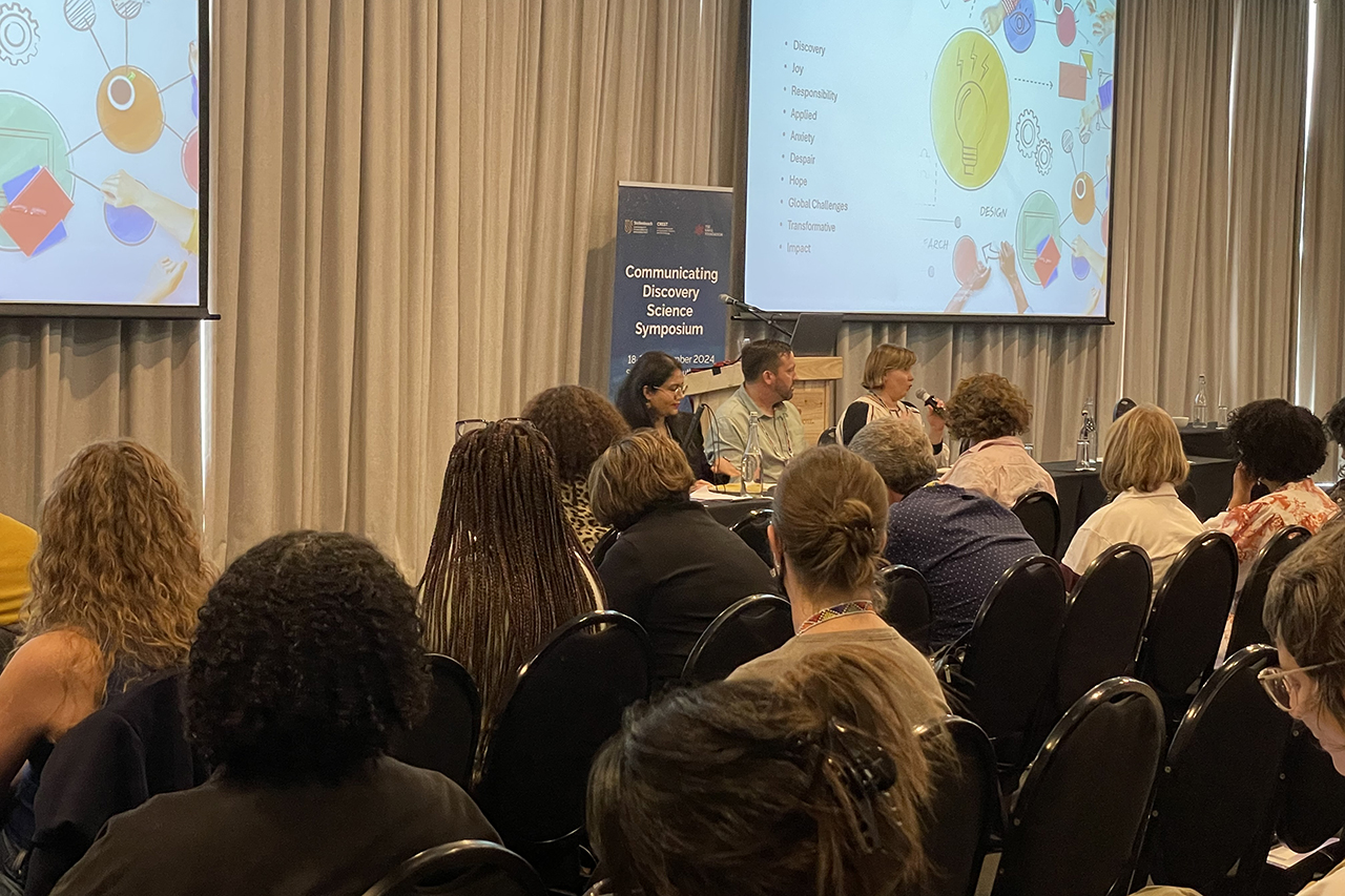 The panel at Plenary 7, "Integrating Policy as an Outcome of Discovery Science Communication," featured Kamini Govender, Michael Ellis, and Allison Eckhardt.